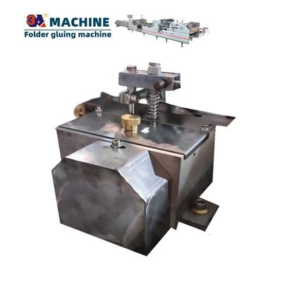 Machines à coller automatiquement des boîtes de carton